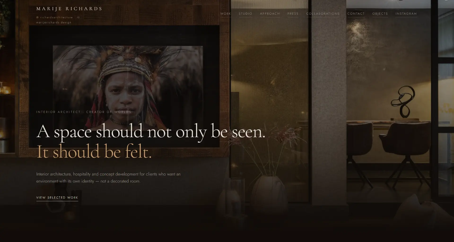 Website of Marije Richards Design: a dark interior with a sculptural chandelier above a dining table